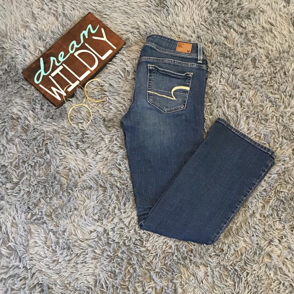 Blue ripped jean American eagle pants.